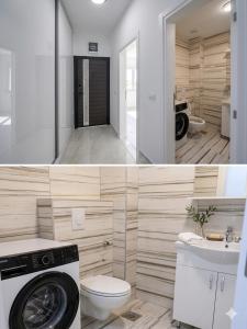 a bathroom with a washer and a toilet and a sink at Apartman SOFI in Ulcinj