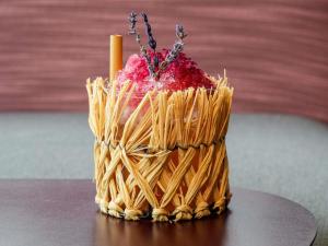 a cake sitting on top of a table at Novotel Paris Vaugirard Montparnasse in Paris