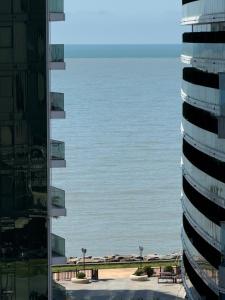 a view of the ocean from a building at Ideal home in Minda
