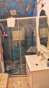a bathroom with a shower and a sink at La MARUZZELLA in Vietri sul Mare