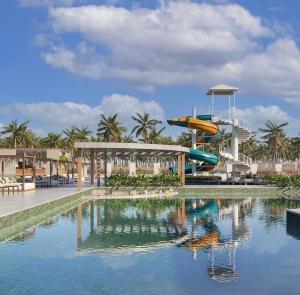 a water slide in a resort with a pool at Gav resort beach in Salinópolis