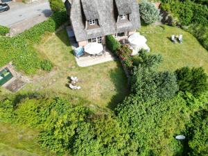 an aerial view of a large house with a yard at Haus Düne in List