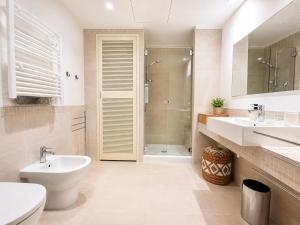 a bathroom with a sink and a toilet and a shower at Rose 3- Climatisation-centre ville-Plage in Menton +36 photos