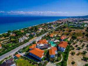 an aerial view of a house with orange roofs at Flegra Palace in Pefkochori