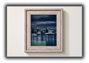 a picture frame with a picture of a city at Pitchside Rooms in Liverpool