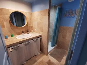 a bathroom with a sink and a shower at Maison Romana in Riez +68 photos