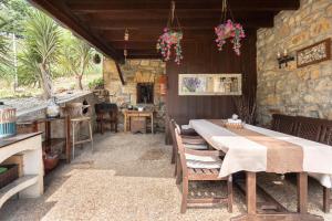 a dining room with a table and chairs at Caserio Urikosolo in Bilbao