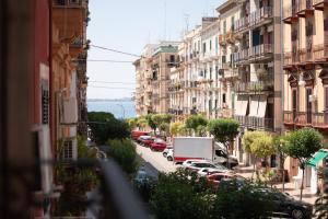 a view of a city street with cars parked at Dimora Altea in Taranto