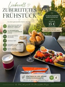 a flyer for a breakfast buffet with a tray of food at Bed and Breakfast - Rheingauer Hof in Oestrich-Winkel