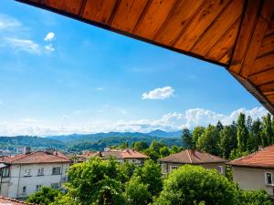a view of a city from a roof at Mountain View Apartment in Troyan