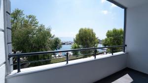 a balcony with a view of the water at Kıyı Hotel Restaurant in Gebze