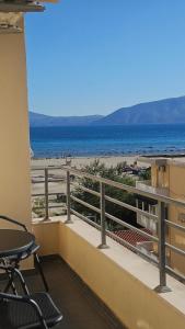 a balcony with a view of the beach at Old Beach Apartments 2 in Vlorë