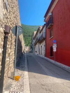 an empty street in a town with buildings at Surripe Casa Vacanze in San Lorenzello