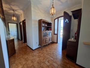 a hallway of a home with a room with a unintention at Sitio dos Machados in Póvoa de Lanhoso +19 photos