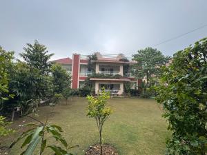 a house with a garden in front of it at Golden Villas in Rewāri