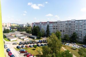 an aerial view of a parking lot in front of a building at Nesporova Apartment in Košice