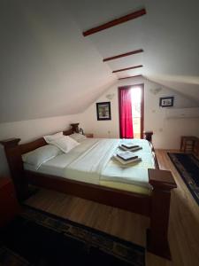 a bedroom with a large bed with a window at Vila Milka in Lepterija +85 photos