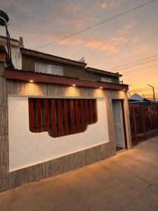 a building with a window on the side of it at Taltal - Casa Dominguez in Taltal