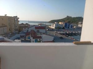 a view of a city from a balcony at Marina tabarka in Tabarka +3 photos