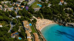 an aerial view of a beach with people on the sand at Casa MEDITERRANEA in Salou