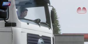 a man sitting in the window of a semi truck at Oussoumana in Matamey