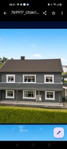 a screenshot of a house with a picture of it at Et soverom, delt bad in Fredrikstad