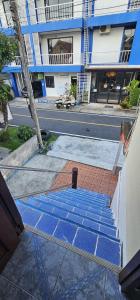 a group of blue tiles on the side of a building at Ao Nang Room And Bike 10 in Ao Nang 