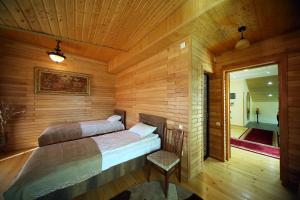 Postel nebo postele na pokoji v ubytování Hotel Harmony