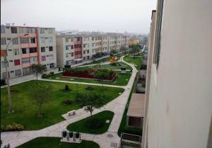 a view from a window of a city with buildings at Torre in Carabayllo