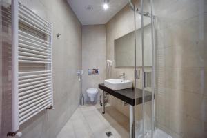Koupelna v ubytování Hotel Ave Lux