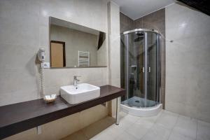 Koupelna v ubytování Hotel Ave Lux