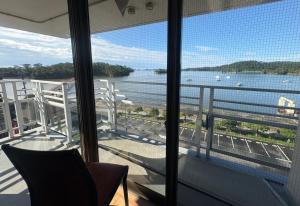 a view of the water from a balcony at ウェルカムイン松島 in Matsushima