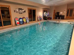a large swimming pool in a hotel room at TnTBnB in Combined Locks