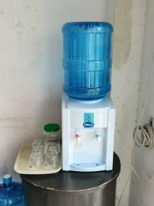 a blue bucket on top of a food processor at Hotel Sutera Maju in Kota Kinabalu