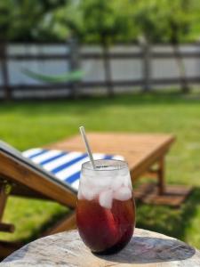 a drink sitting on top of a table at Surf Inn in Klaipėda