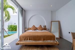 a bedroom with a bed and a large window at Villa Luminosa 3 by Bukit Vista in Uluwatu +33 photos