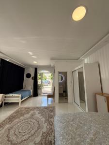 a large bedroom with a bed and a mirror at Vengo Apartments in Kotor +43 photos
