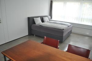 Postel nebo postele na pokoji v ubytování Loft AR