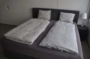 Postel nebo postele na pokoji v ubytování Loft AR