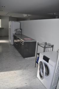 Kuchyň nebo kuchyňský kout v ubytování Loft AR
