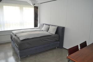 Postel nebo postele na pokoji v ubytování Loft AR