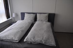 Postel nebo postele na pokoji v ubytování Loft AR