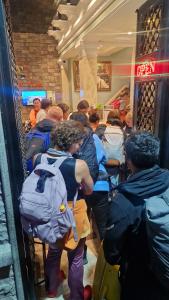 a group of people sitting on a train at Anadolu Hotel & Restaurant & Spa in Batumi