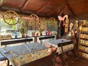 a dining room with two tables andokedokedokedokedoked at Casa Yva Black Sea in Venus