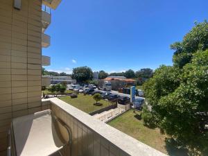 a balcony with a view of a parking lot at Casa Boa Nova Valadares in Valadares
