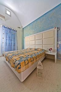 Posteľ alebo postele v izbe v ubytovaní Sellada Apartments
