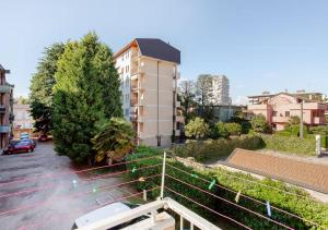 a view of a parking lot with a building at Nadilla House Castellanza Humanitas Liuc in Castellanza