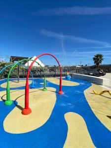 an empty water park with a water slide at Mobilhome camping St jacques in Sarzeau