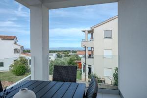a view from the balcony of a house at Apartment Rahat in Ližnjan