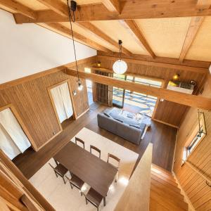 an overhead view of a dining room and living room at Setouchi Retreats Sera Highlands in Egi +19 photos